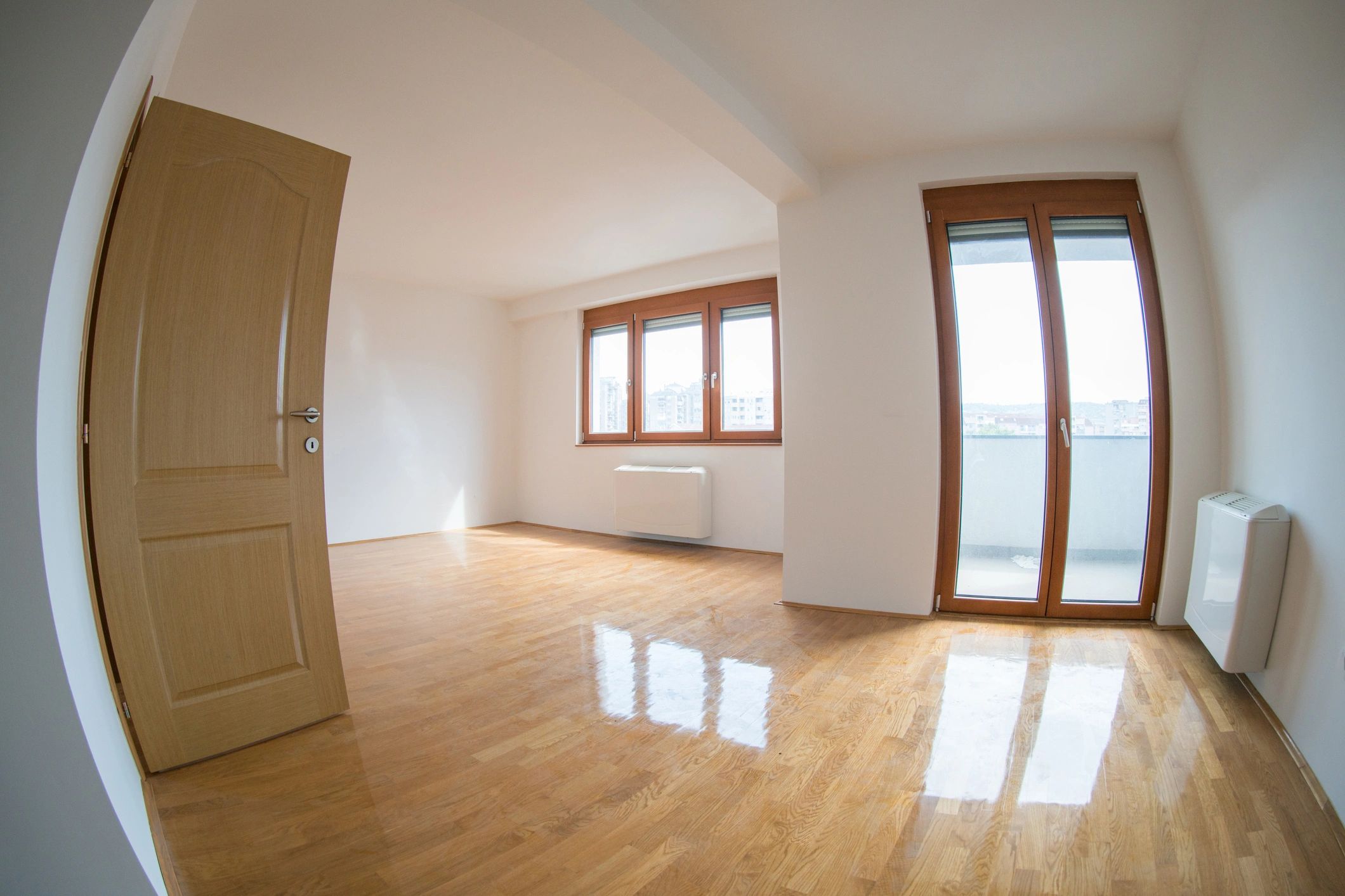 Interior space with warm wood flooring